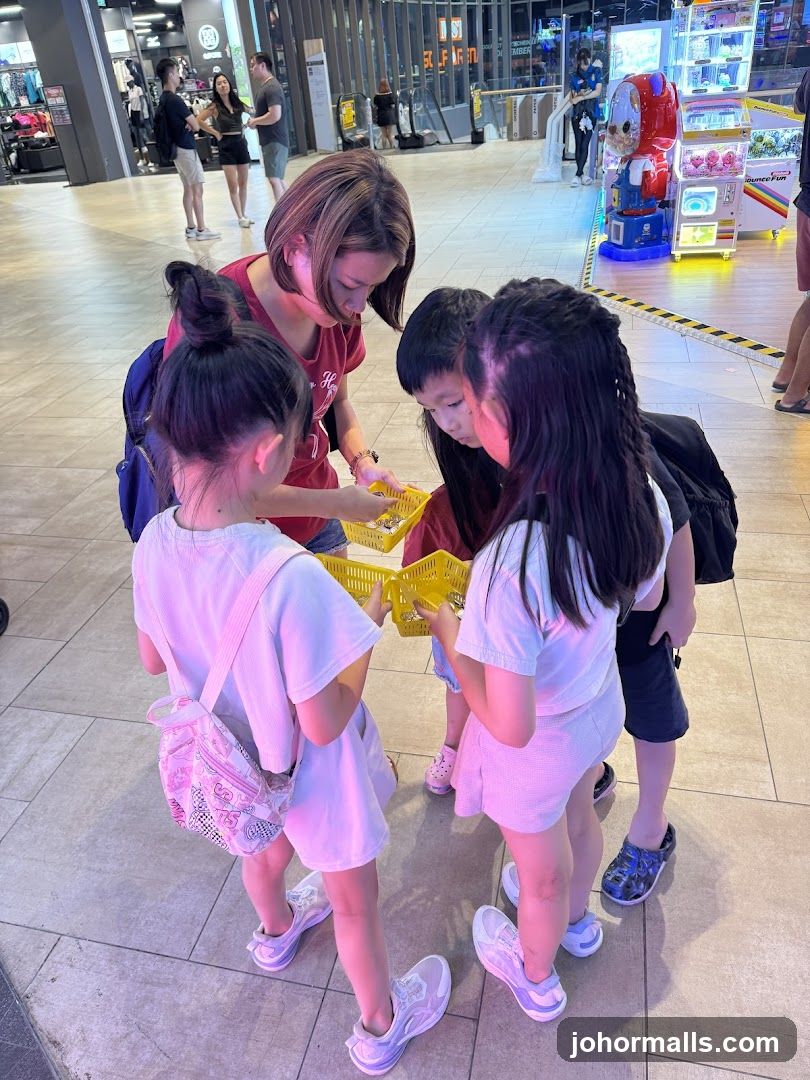Children and woman looking at yellow baskets