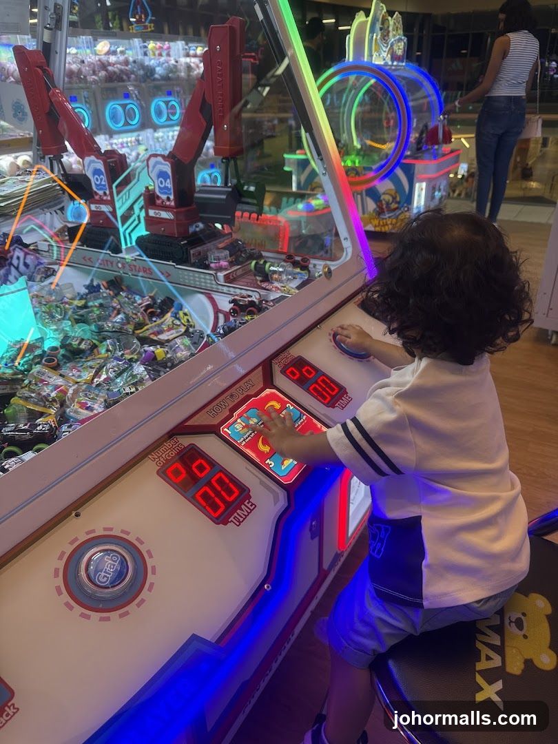 Child Playing Claw Machine