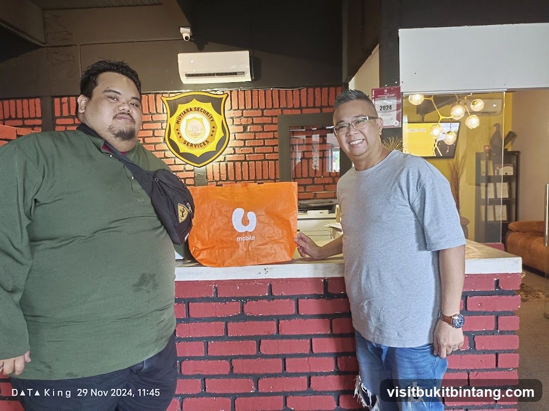 Two men with a shopping bag