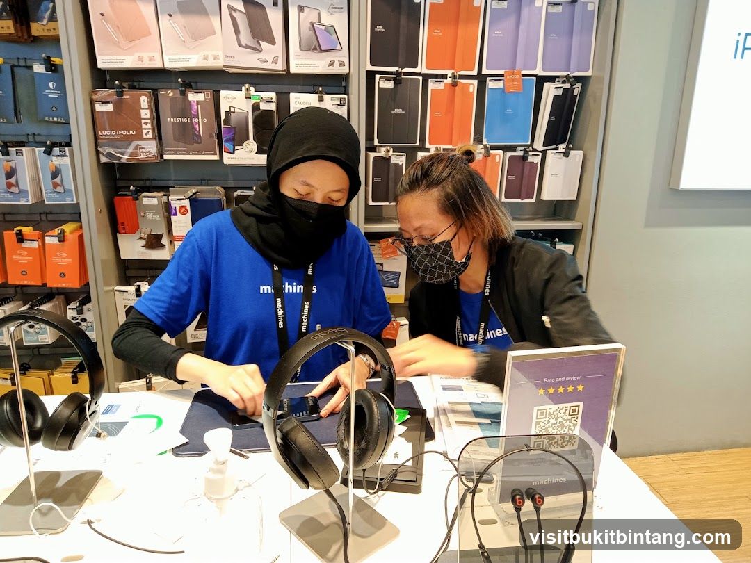 Store Employees Assisting Customers