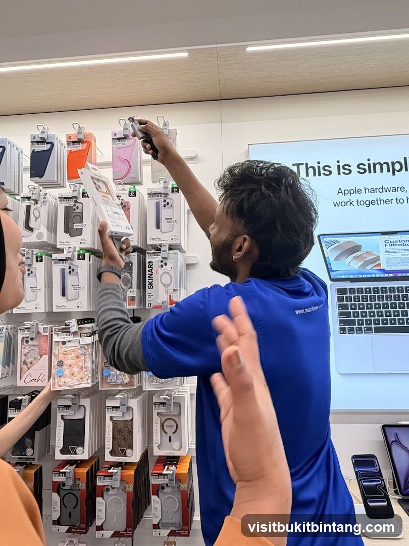 Store employee assisting customer