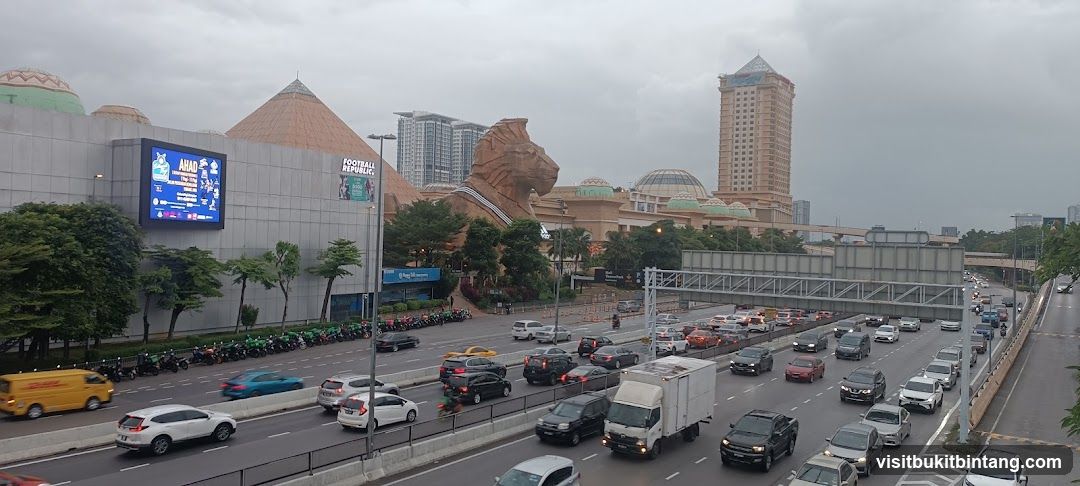 Busy Highway with Large Shopping Complex