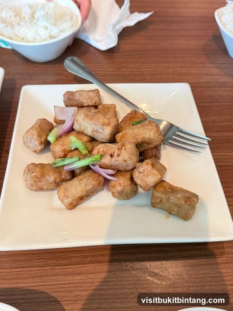 Fried Pork Bites with Onion and Scallions