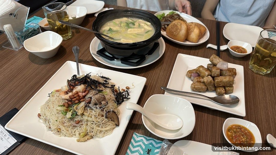 Table with various dishes and drinks