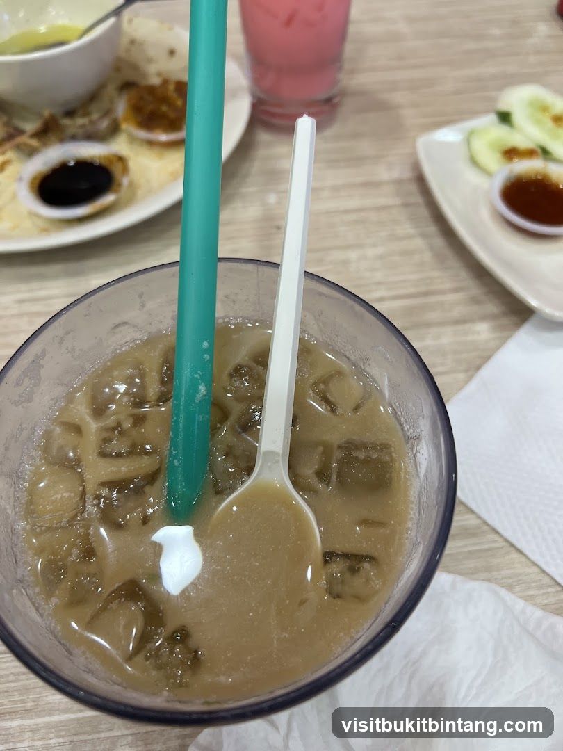 Iced Coffee with Spoon and Straw