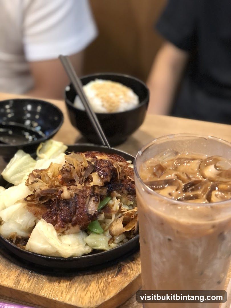 Sizzling Plate with Rice and Drink