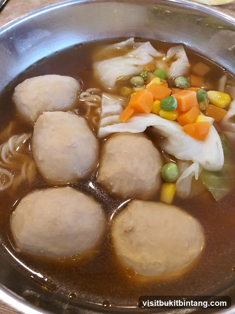 Noodle Soup with Meatballs and Vegetables