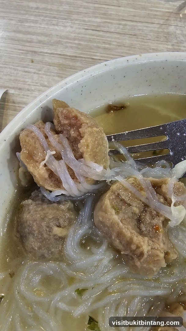 Bowl of Noodles and Meatballs