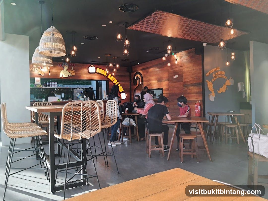 Interior of a restaurant with wooden accents and modern lighting