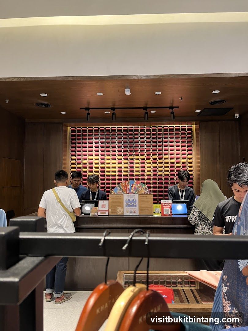 Retail counter with staff and customers