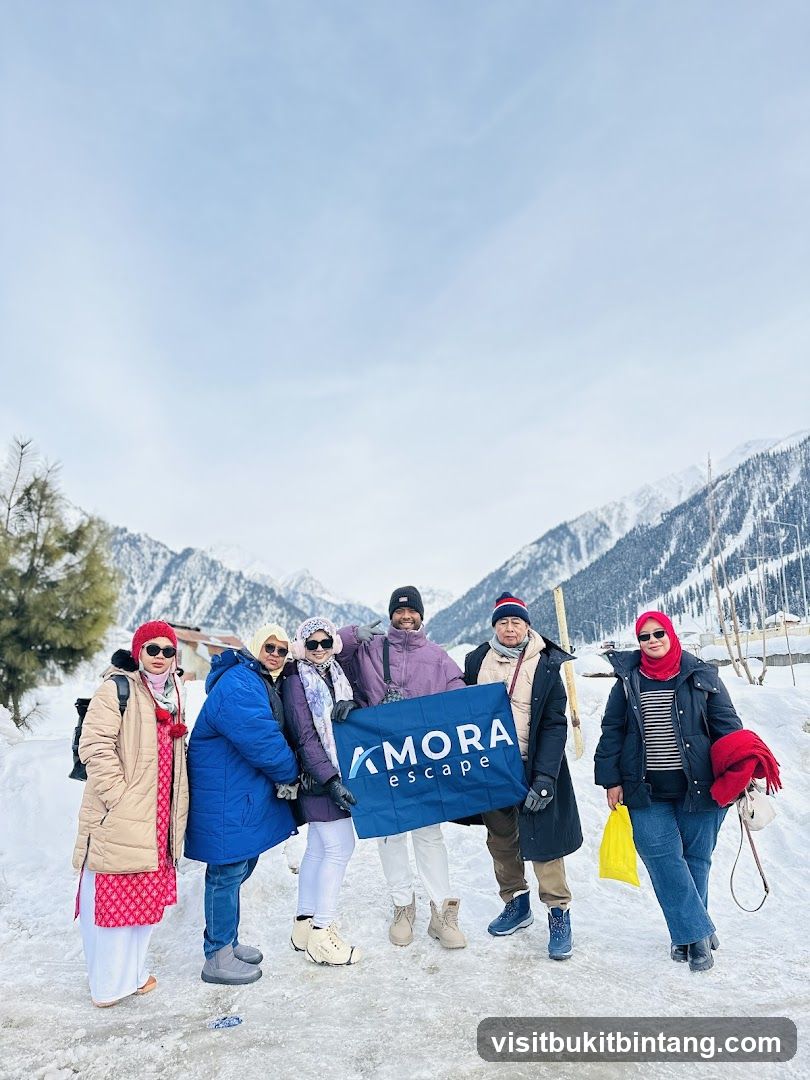 Group holding a banner in the snow