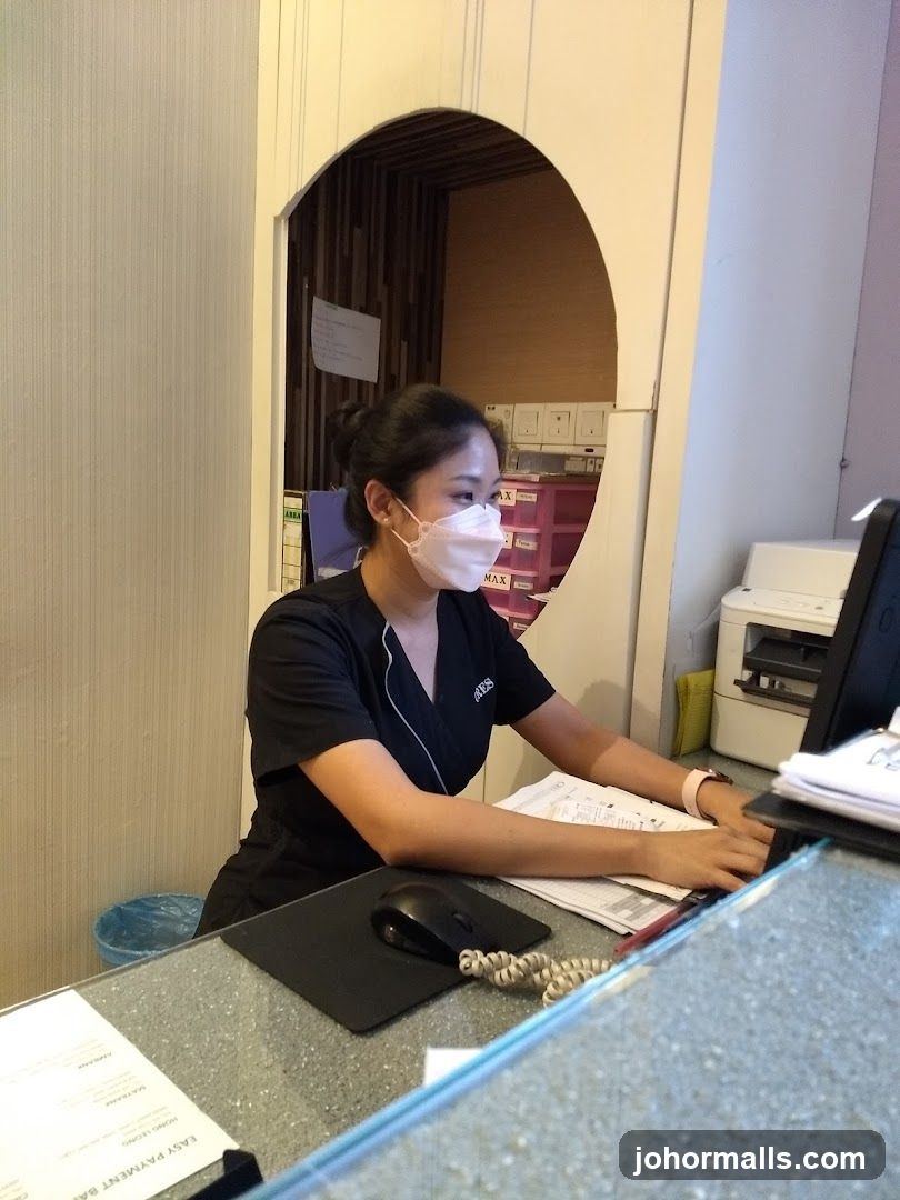 Receptionist at Desk