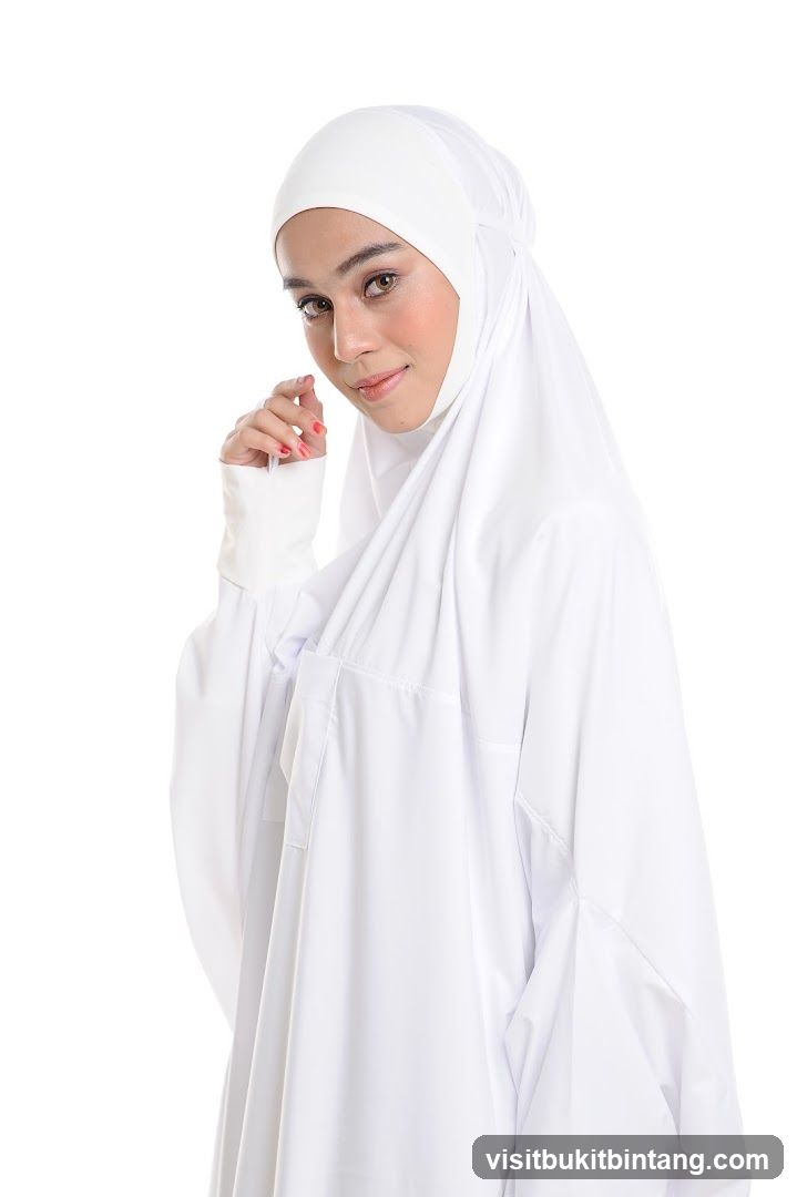 Woman in white prayer garment
