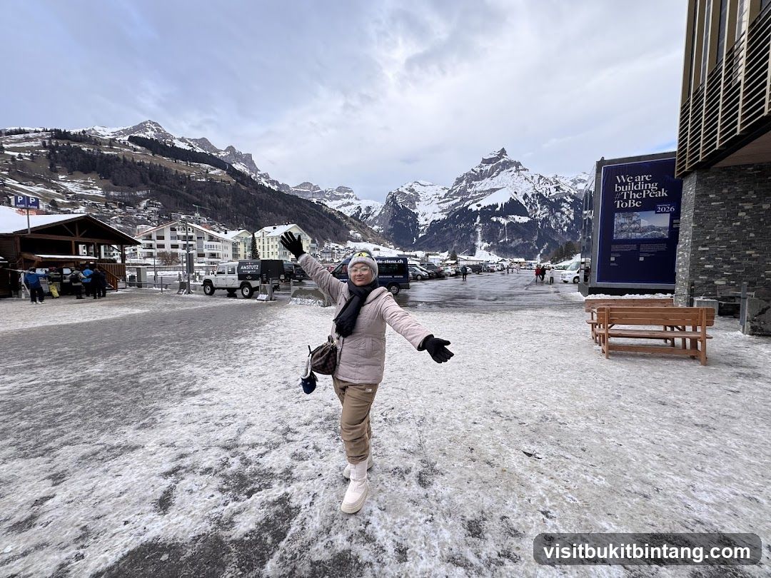 Woman posing in snowy mountain village