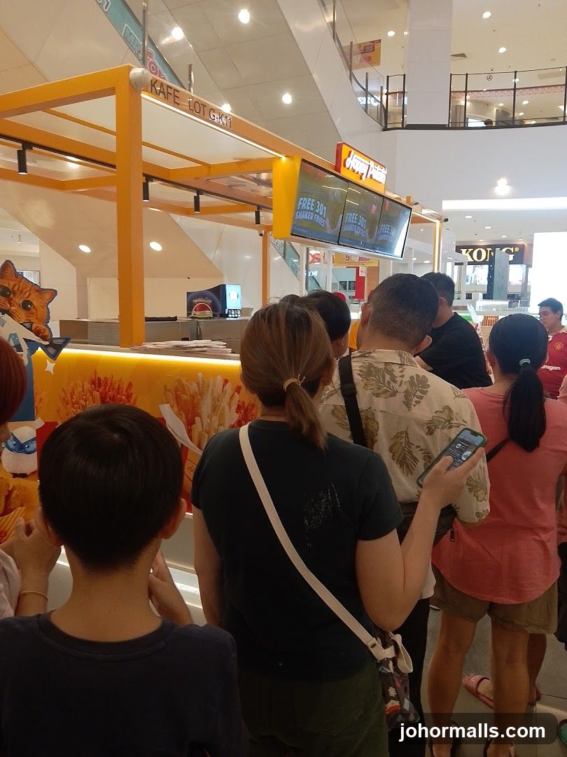 People in line at a food stall