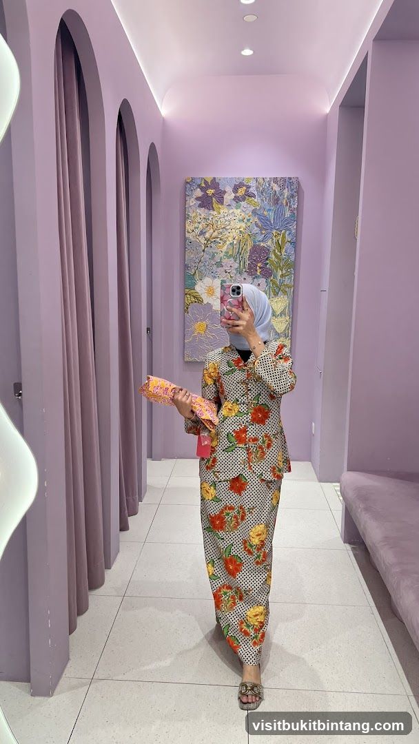 Woman in floral outfit in a boutique