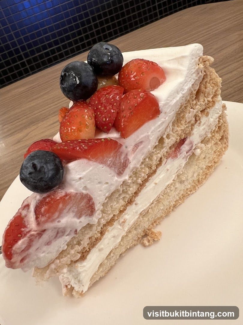 Slice of Strawberry and Blueberry Cake