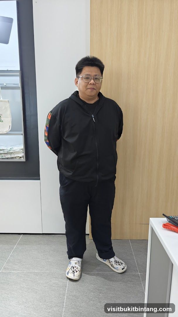 Man in a black hoodie