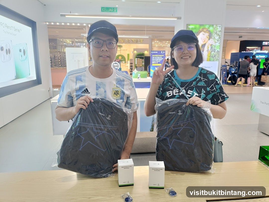 Two people holding branded bags