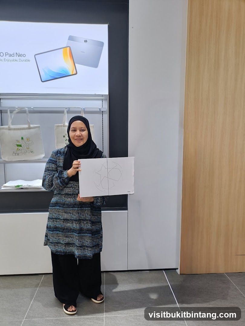 Woman holding a box in a store