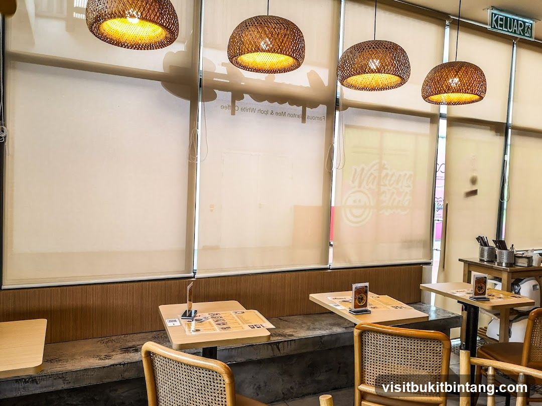 Cafe Interior with Wicker Lamps and Seating