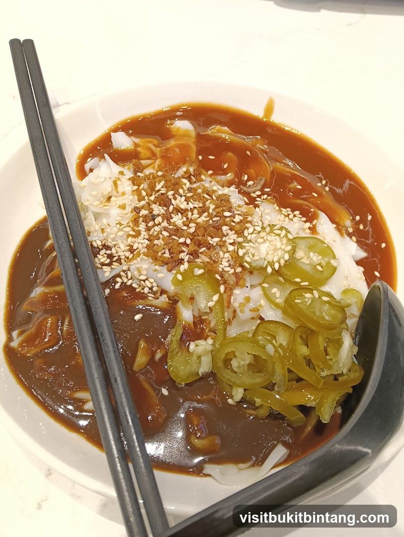 Chee Cheong Fun with Chili and Sesame Seeds