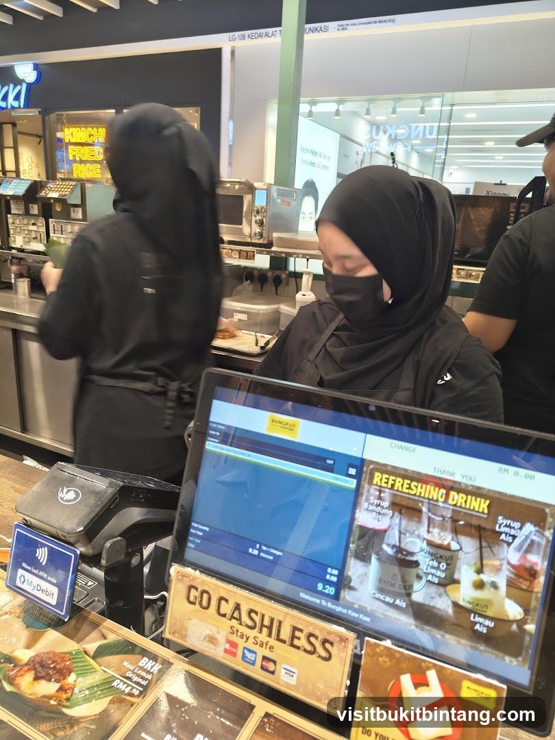 Cashier at a food stall