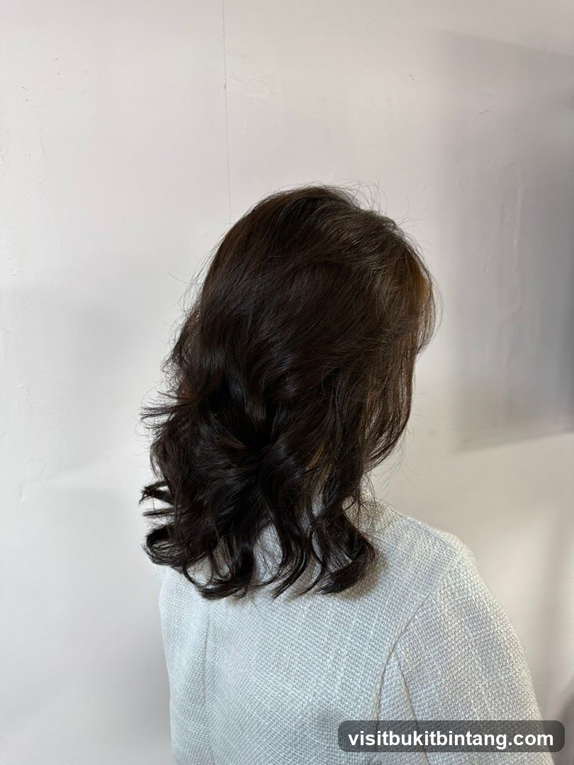 Woman with styled dark hair