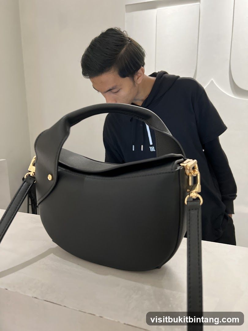 Man with Black Handbag
