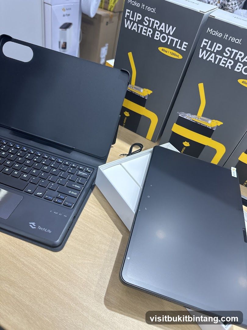 Tablet and Keyboard with Water Bottle Packaging