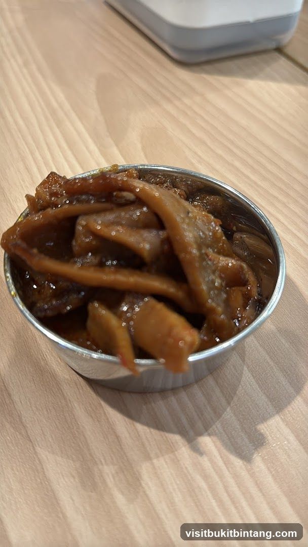 Small bowl of braised food