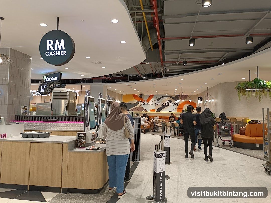 Self-service kiosks and seating area in a mall