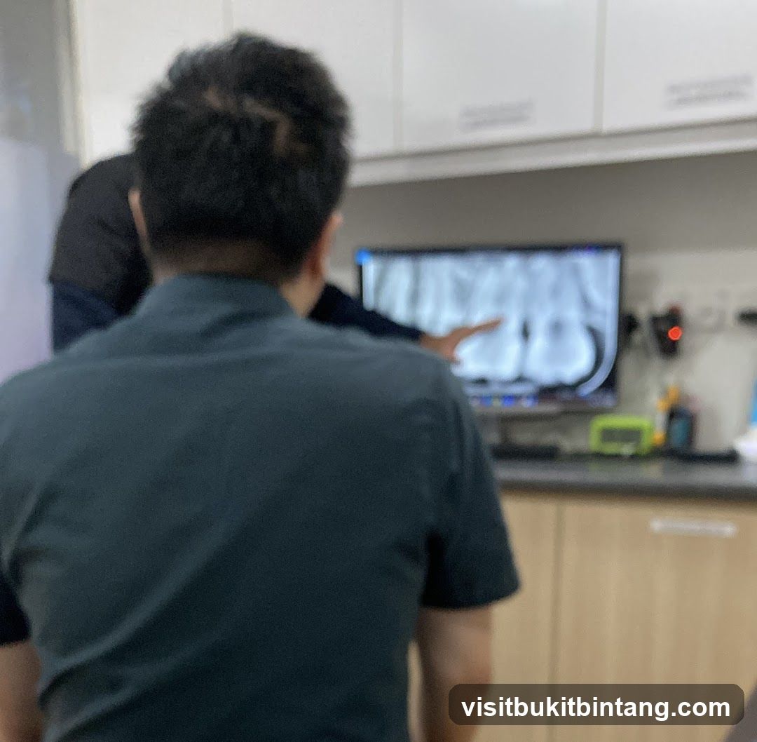 Dentist reviewing X-rays
