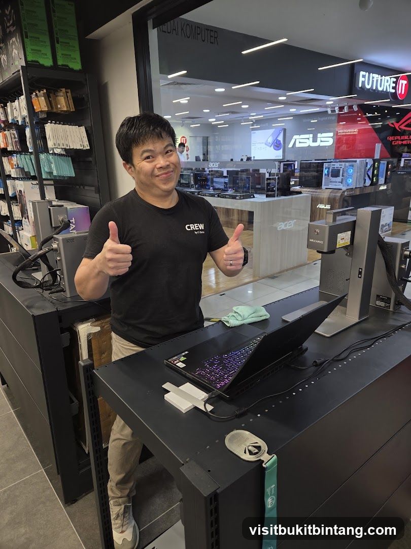 Man giving thumbs up in computer store