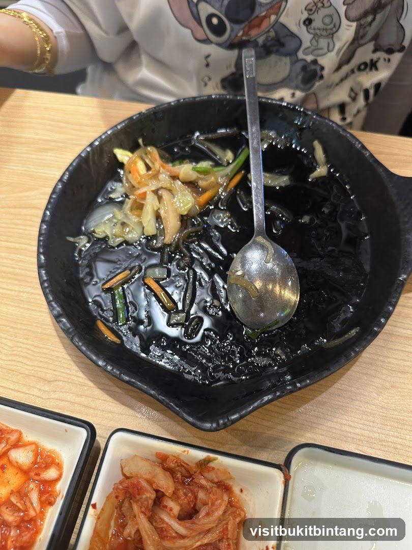 Partially Eaten Meal with Kimchi