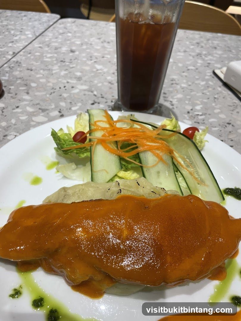 Fish dish with salad and iced tea