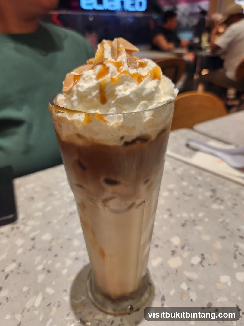 Iced Coffee with Whipped Cream and Caramel Drizzle