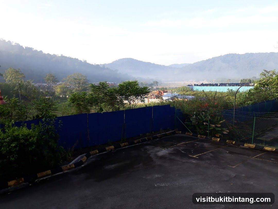 Misty Mountain Landscape with Parking Lot