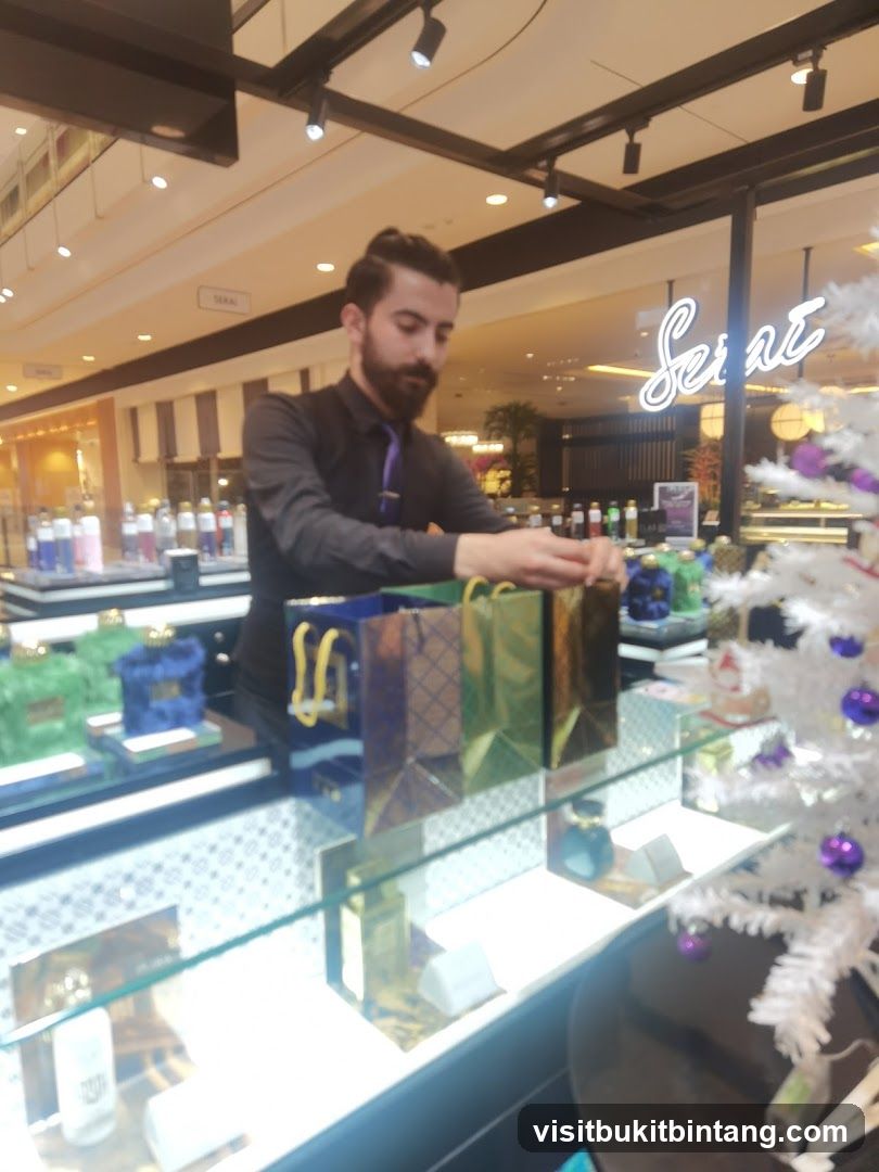 Man arranging gift bags at a counter