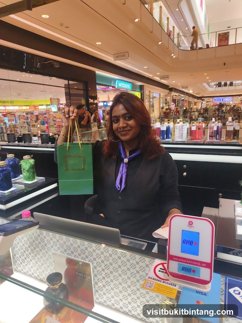 Sales associate holding a shopping bag