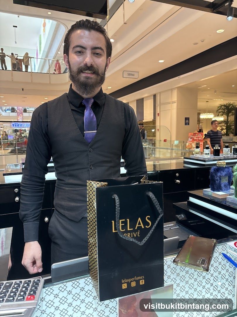 Sales Associate with Shopping Bag
