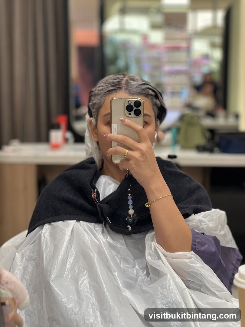 Woman getting hair dyed