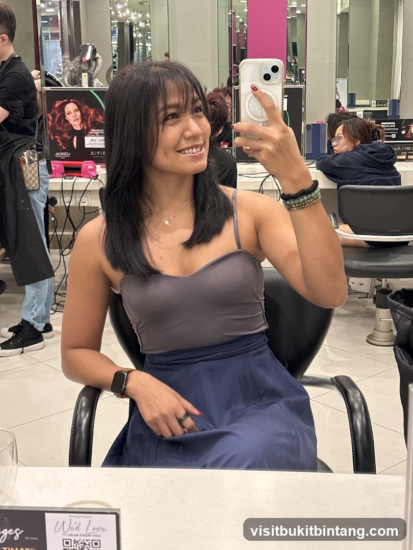 Woman taking a selfie in a salon