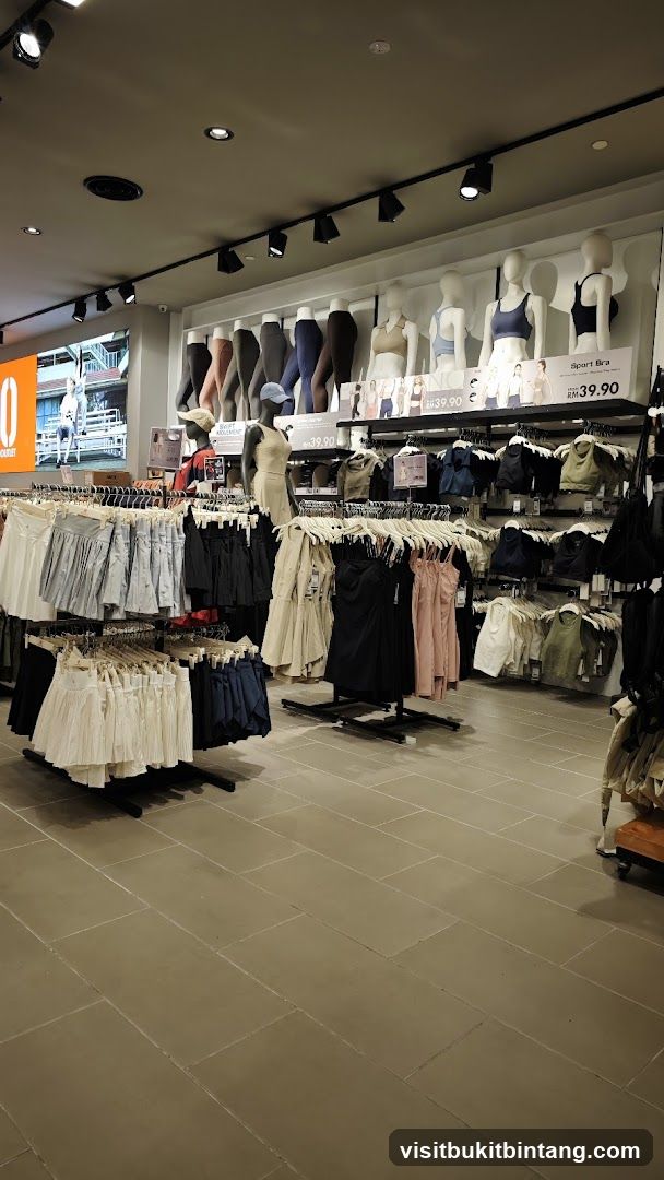 Clothing store interior with mannequins and apparel