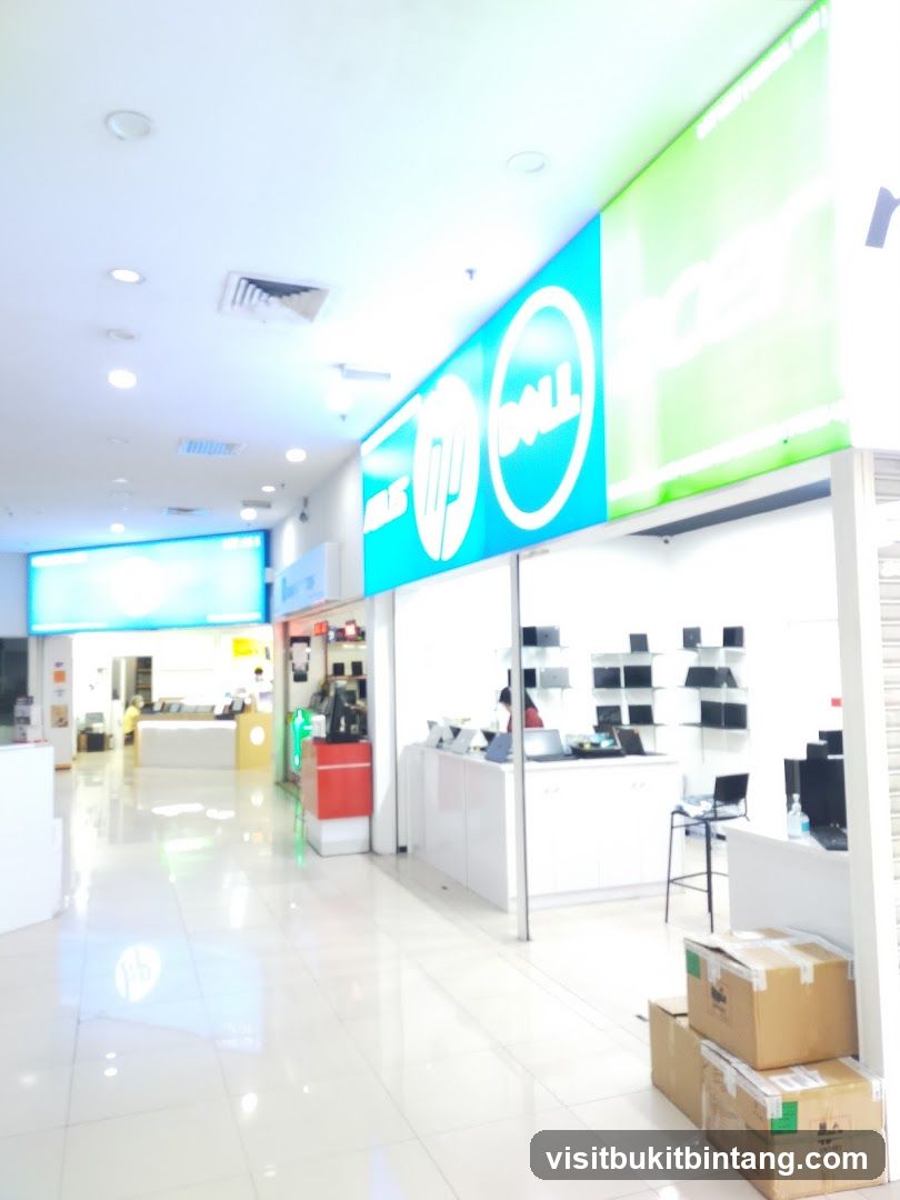 Computer store interior with brand signage