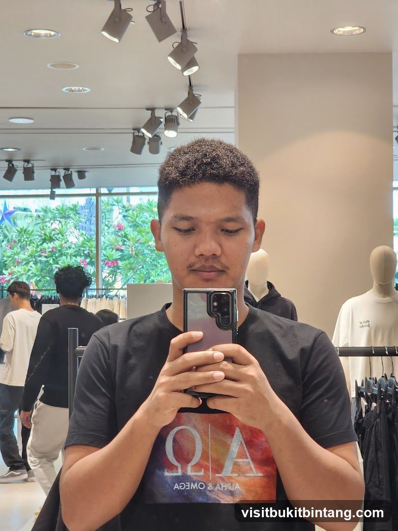 Man taking a selfie in a clothing store