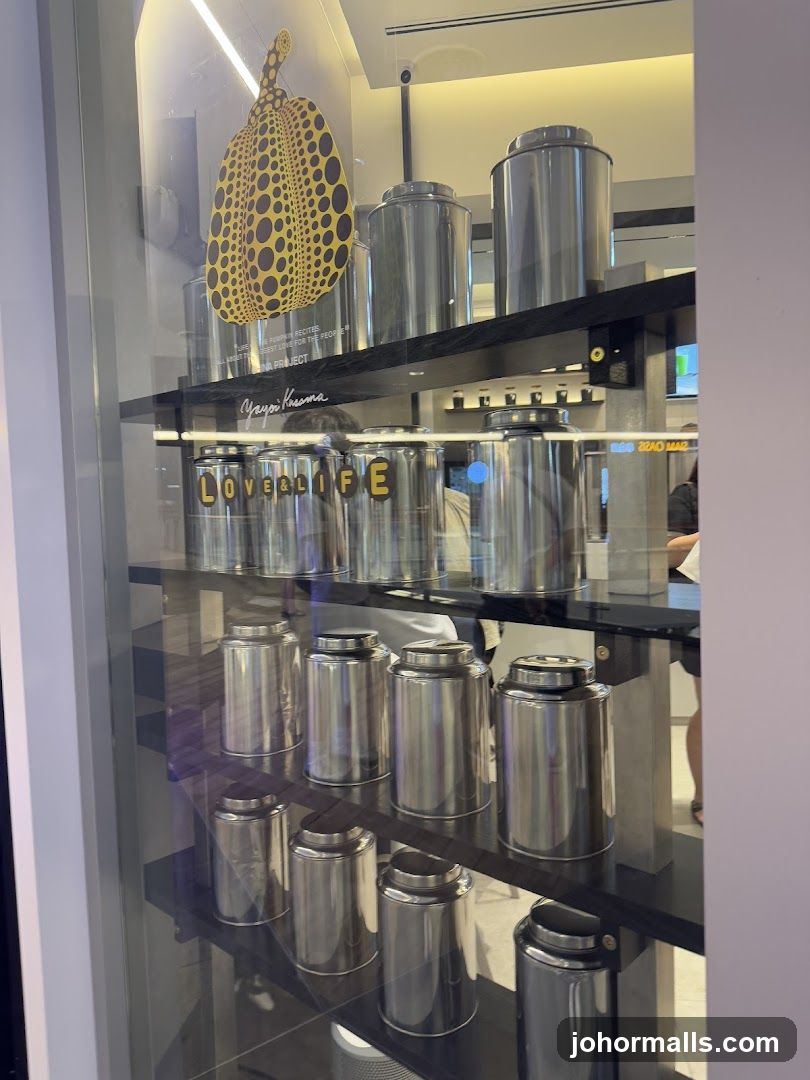 Display of Yayoi Kusama artwork and canisters