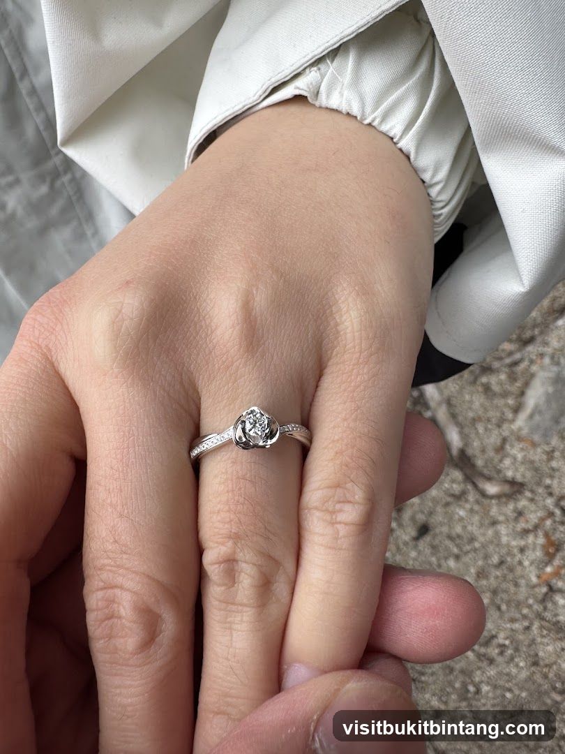 Close-up of hands wearing a ring