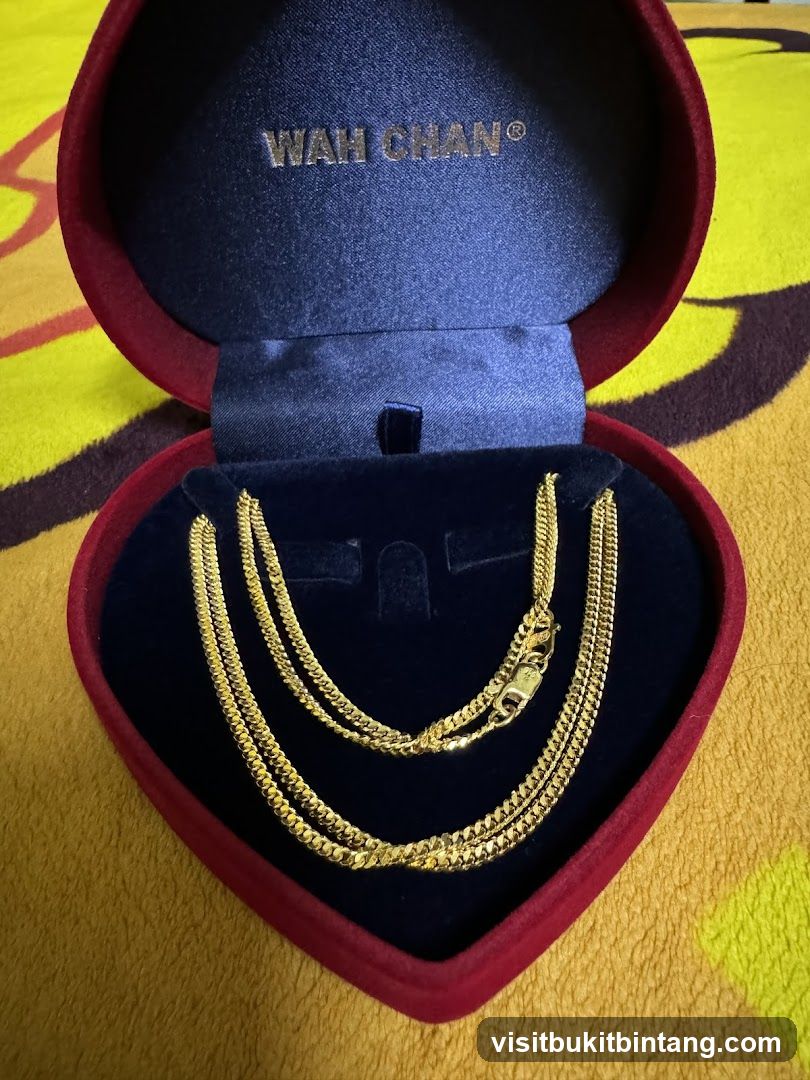 Gold Necklace in a Heart-Shaped Box