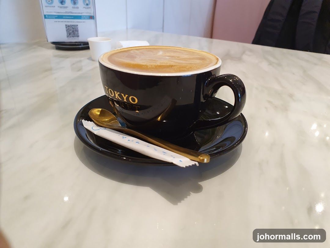 Latte with Spoon and Sugar Packet